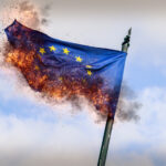 Flag,Of,European,Union,Burning,With,Ashes,-,Conceptual,For