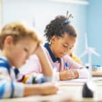 In,Elementary,School,Classroom,Brilliant,Black,Girl,Writes,In,Exercise