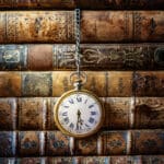 Vintage,Clock,Hanging,On,A,Chain,On,The,Background,Of