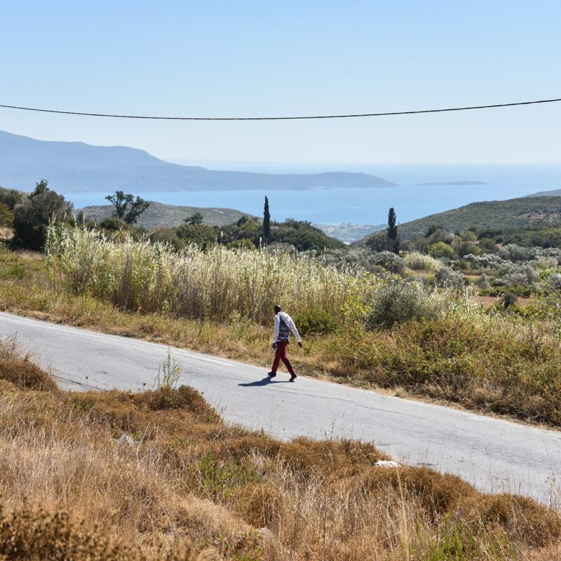 A Refugee Walking 8 Kilometers from the New Closed Zervou Refugee Camp in Samos, Greece to the Next Town, Vathy